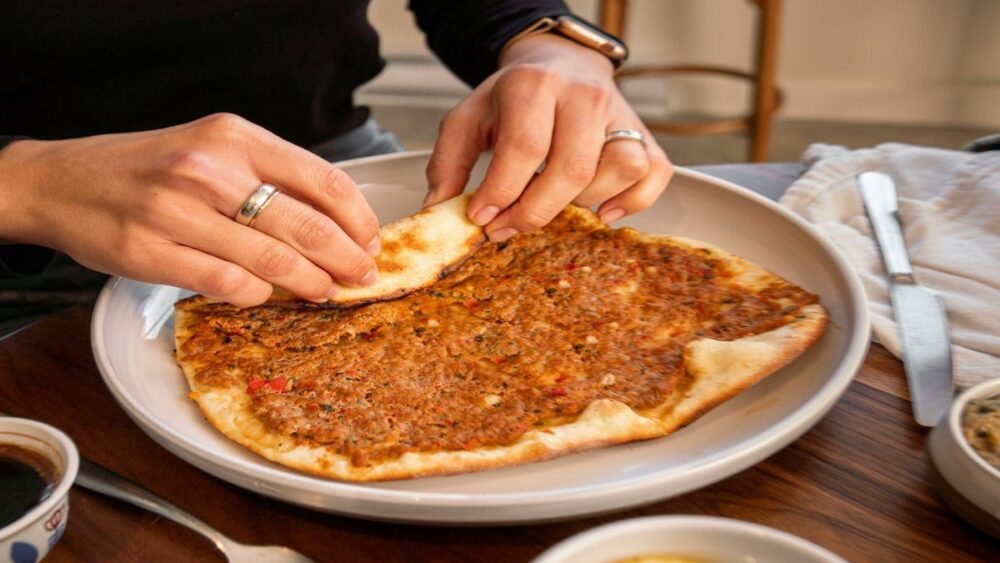 Tracing the Origins of Pizza: A Journey from Armenian Lahmajoun to the Italian Piazza